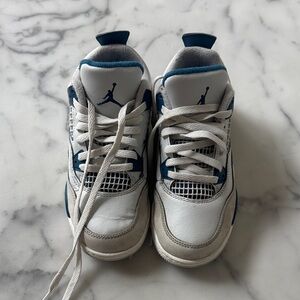 Jordan 4 Retro White and Blue Sneakers